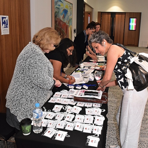 April Bragg at registration desk