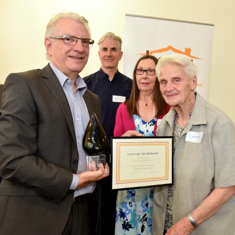 Commissioner for Senior Victorians Gerard Mansour awarding a lifetime membership award to HAAG member Carmel McMennemin 